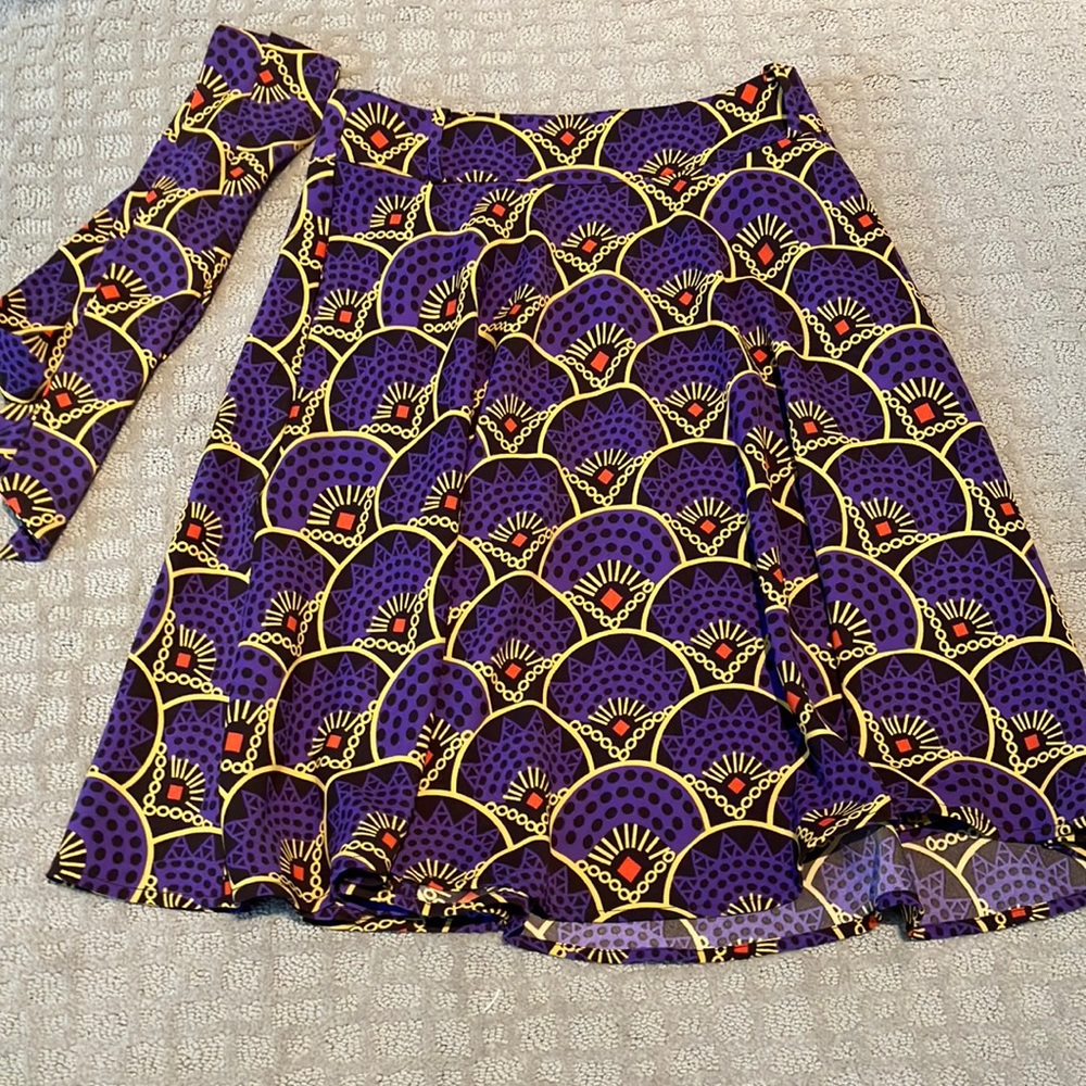 Fab vintage inspired purple mustard orange black fab patterned circle skirt.